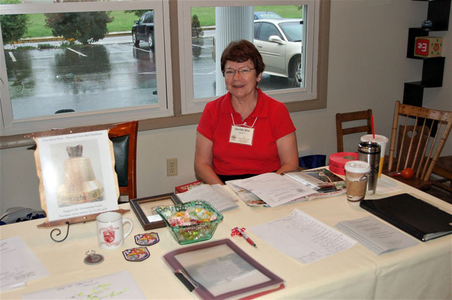 Dorothy Wise at the registration table