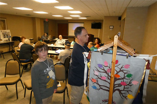 Chris & Wyatt Chrislip organizing our banners.
