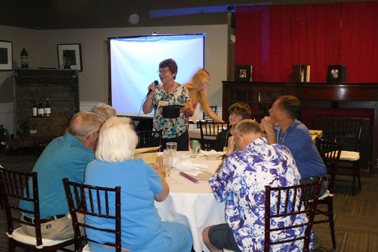 Dorothy Wise, awarding door prizes.